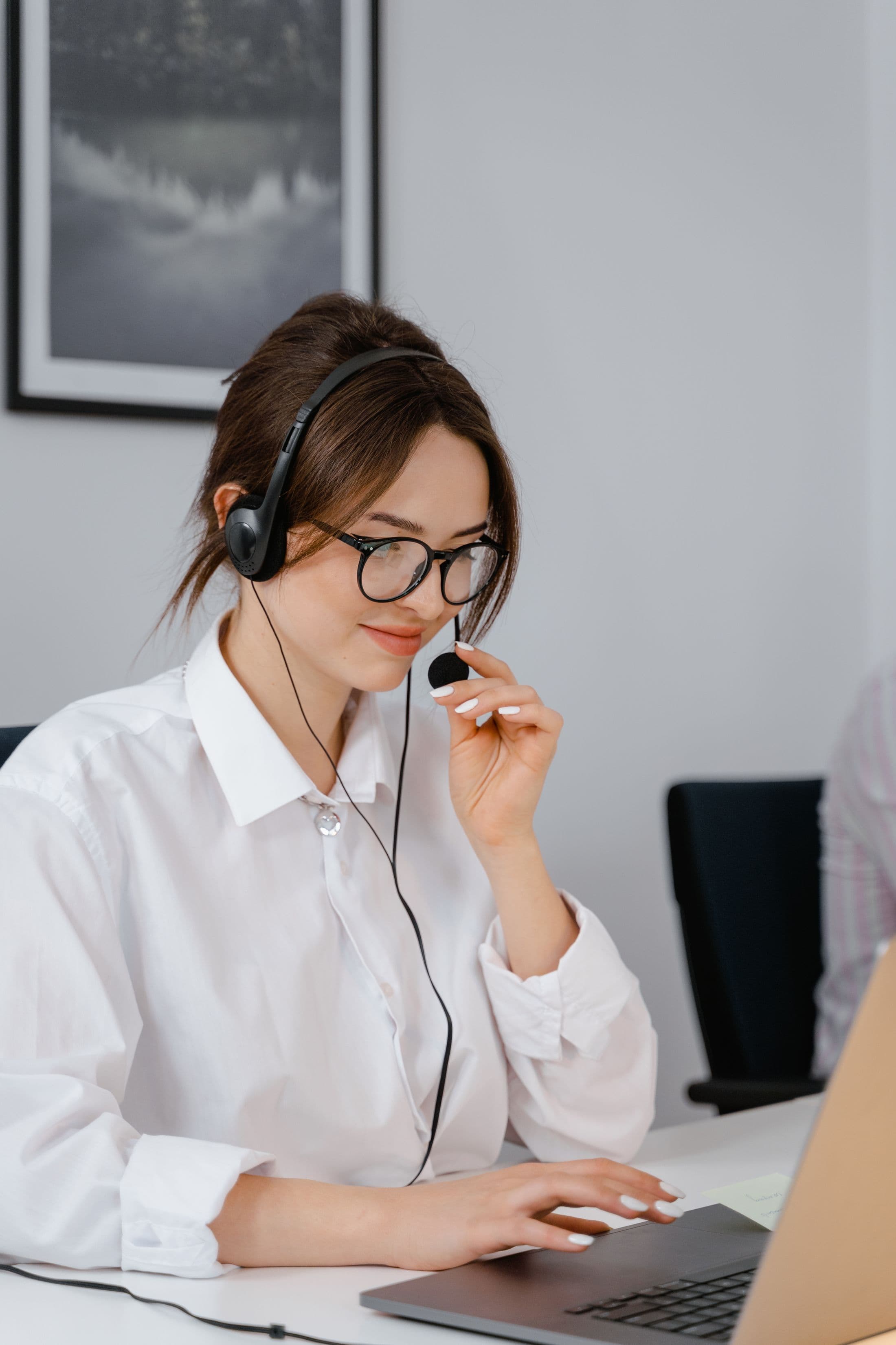 Professional customer service representative answering a business call